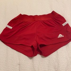 Red women’s adidas running shorts XS